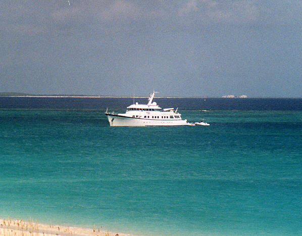 There were some flash private yachts that used to drop anchor in Grace Bay. (52k)