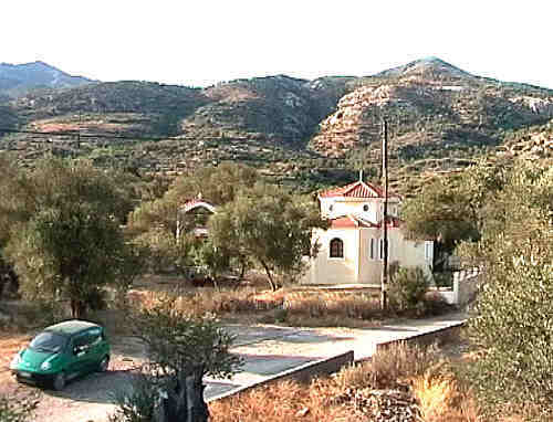 View from the balcony of our apartment out the back over the church into the hills.