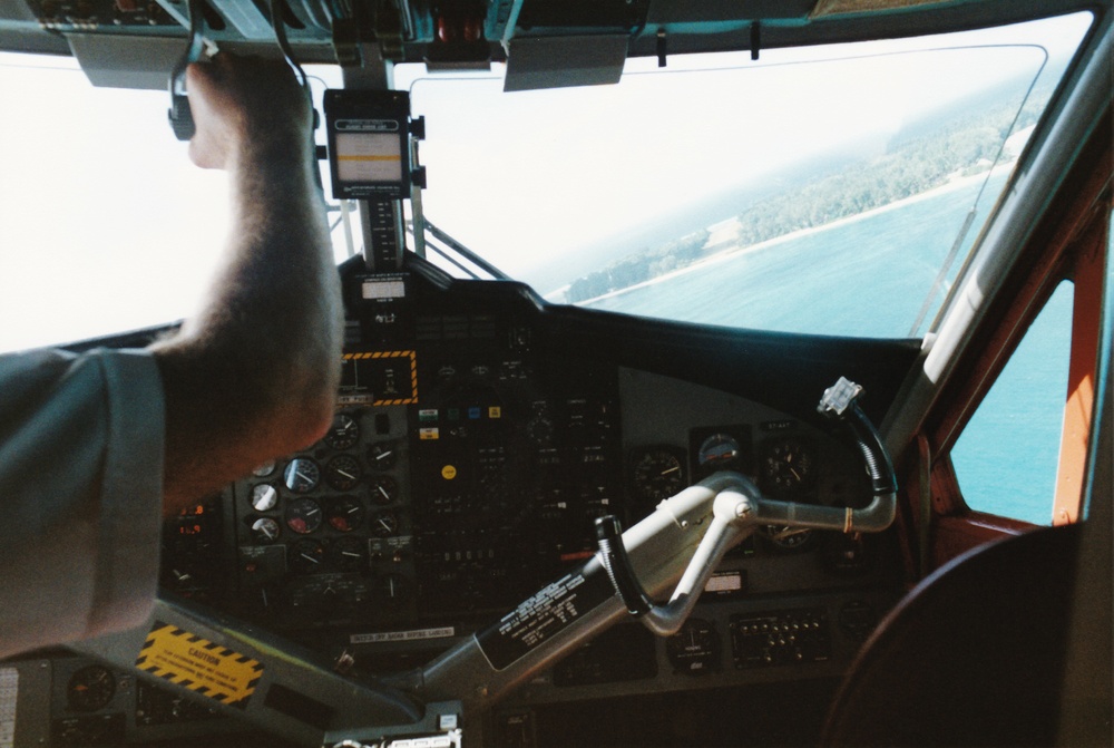 Coming in to land on the grass airstrip at Denis Island.  The rooms are a short walk to the right.