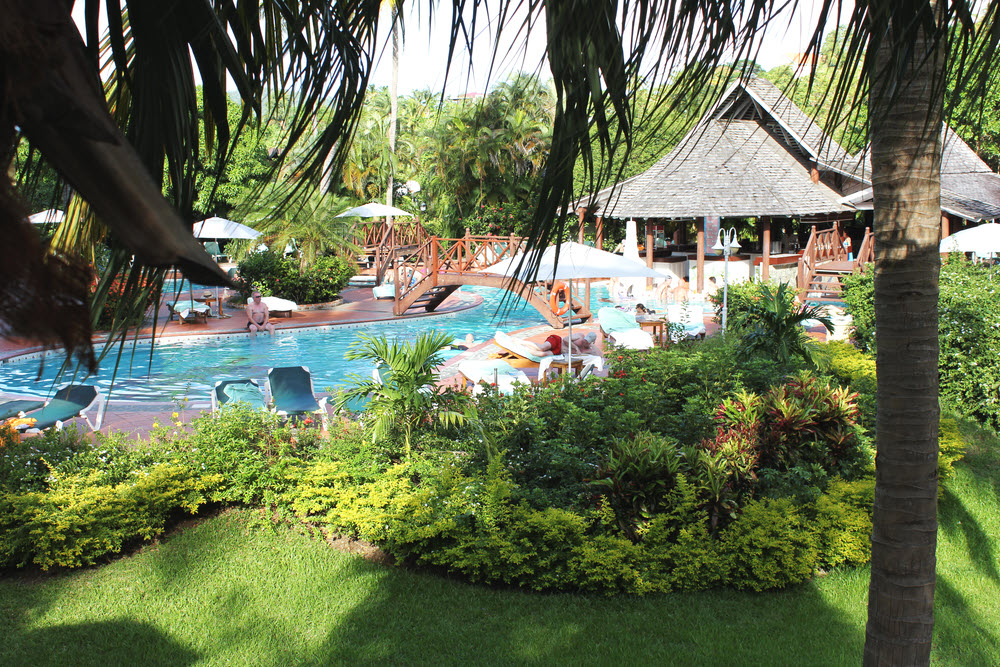 View from our balcony over the gardens to the Paradise Pool.    (396k)