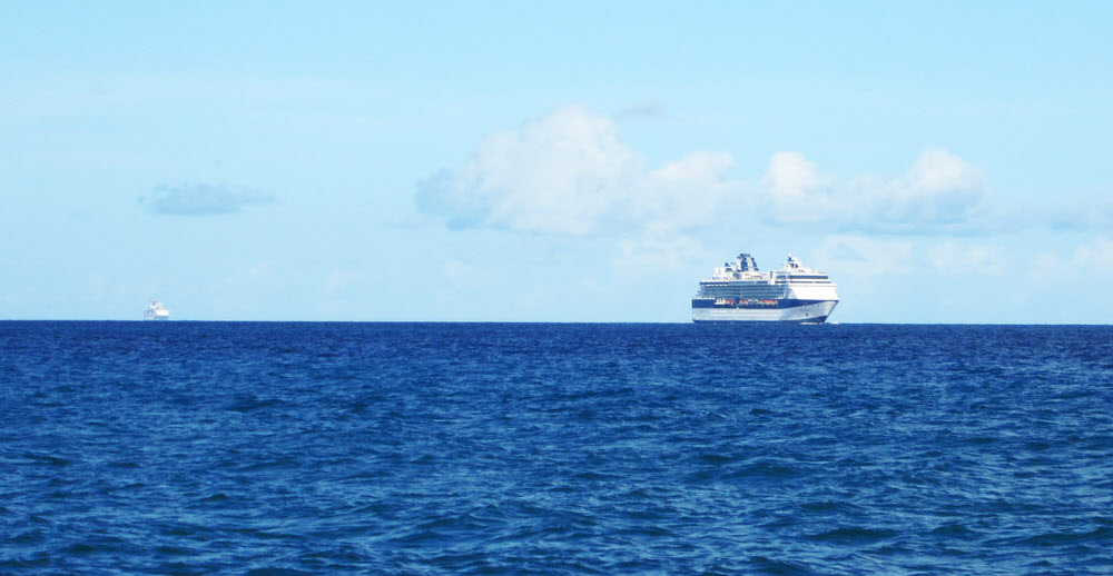 Huge cruise ships queuing up to get into Castries Harbour.  (103k)