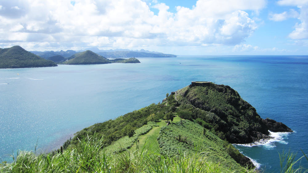 View from Signal Peak looking over Fort Rodney down the west coast of St Lucia.  (111k)