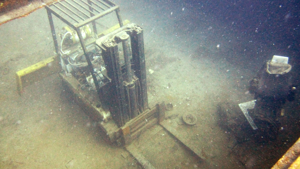 A fork-lift truck in the Vicki B's hold.