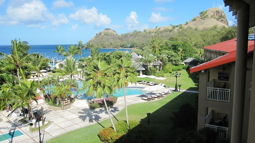 And looking to the right over a quieter pool with jacuzzis to Pigeon Island.