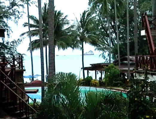 The swimming pool and the sea beyond, from the prow of our rice barge (ie the balcony).